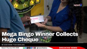 Mega Bingo Winner Collects Huge Cheque 